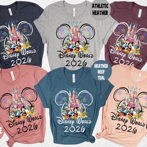 May include: A set of three ceramic mugs with a speckled, matte finish. The mugs are in shades of cream, light gray, and dark gray. Each mug has a simple, minimalist design and a rounded handle.