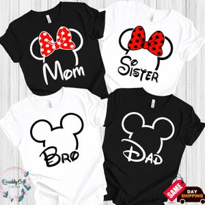 four t-shirts with the Disney character Mickey Mouse ears and the names "Mom", "Sister", "Bro", and "Dad" printed on them.