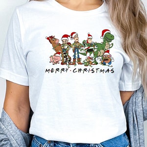 a woman wearing a white merry christmas shirt