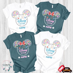 four Disney-themed t-shirts, each with a unique design featuring Mickey Mouse ears and the text "Disney 2020" and "NAME".