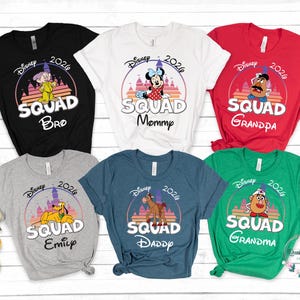 May include: A set of three ceramic mugs with a speckled, matte finish. The mugs are in shades of cream, light gray, and dark gray. Each mug has a simple, minimalist design, perfect for coffee or tea.