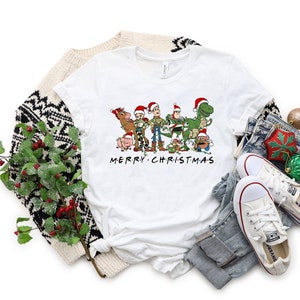 a white t - shirt with the words merry christmas on it