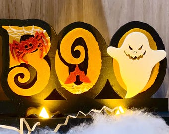 Stand de Halloween impreso en 3D con velas de té.