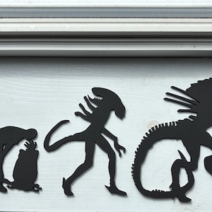 Xenomorph Evolution Wall Art Set - Alien Inspired Sci-Fi Silhouette Decor - 6 Piece Laser Cut Wall Hanging - Horror & Movie Room Decor