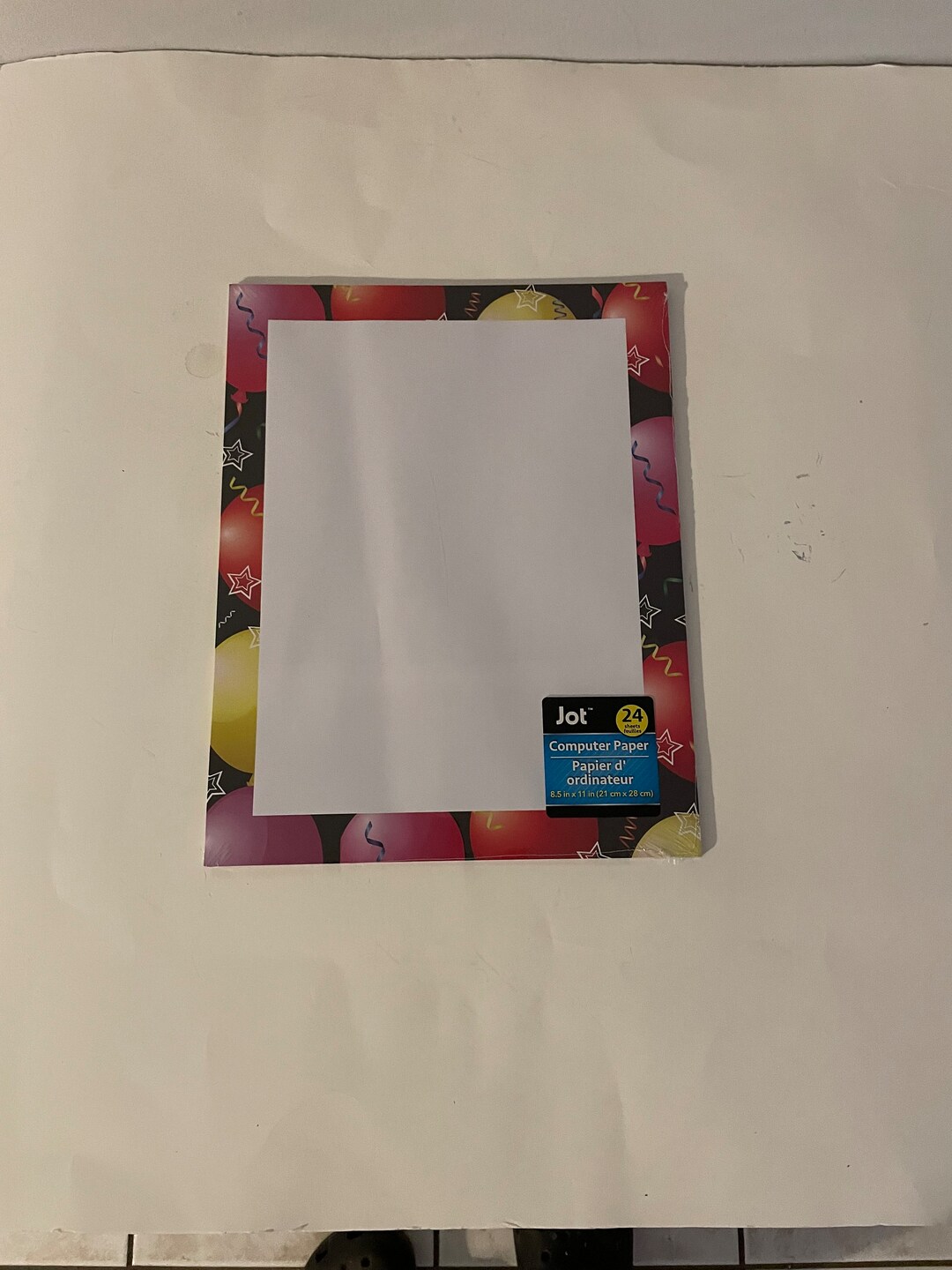 Twenty Four Sheets of Computer Paper With Large Balloons Confetti on