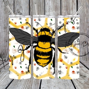 May include: Three stainless steel tumblers with a white background and a repeating pattern of honeycombs, bees, and flowers. The center tumbler features a large bee with black and yellow stripes.