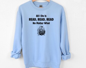 May include: Light blue sweatshirt with the text "All I Do Is READ, READ, READ No Matter What" and a skeleton reading a book.