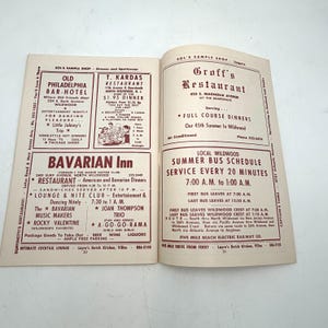 May include: Open vintage brochure featuring advertisements for restaurants and entertainment venues in Wildwood, New Jersey. Includes listings for the Old Philadelphia Bar-Hotel, T. Kardas Restaurant, and Bavarian Inn, with details on dining, entertainment, and bus schedules.