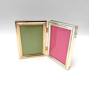 May include: A rustic wooden sign with the text "Welcome to our home" in white lettering. The sign features a distressed finish and a simple, inviting design, perfect for entryway decor.