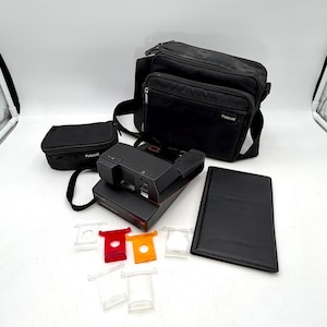 WORKS! Vintage Polaroid Impulse SE camera with strap, bag, filter set, photo album, prism, film, 1980s, 1990s, tested