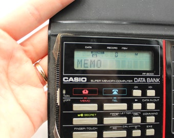 CASIO PF 8000 DATA BANK calculatrice digitale avec notice