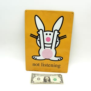 It&#39;s Happy Bunny Y2K metal wall sign - vintage, 2000s, 1990s, Jim Benton, Not Listening, merchandise, art, poster