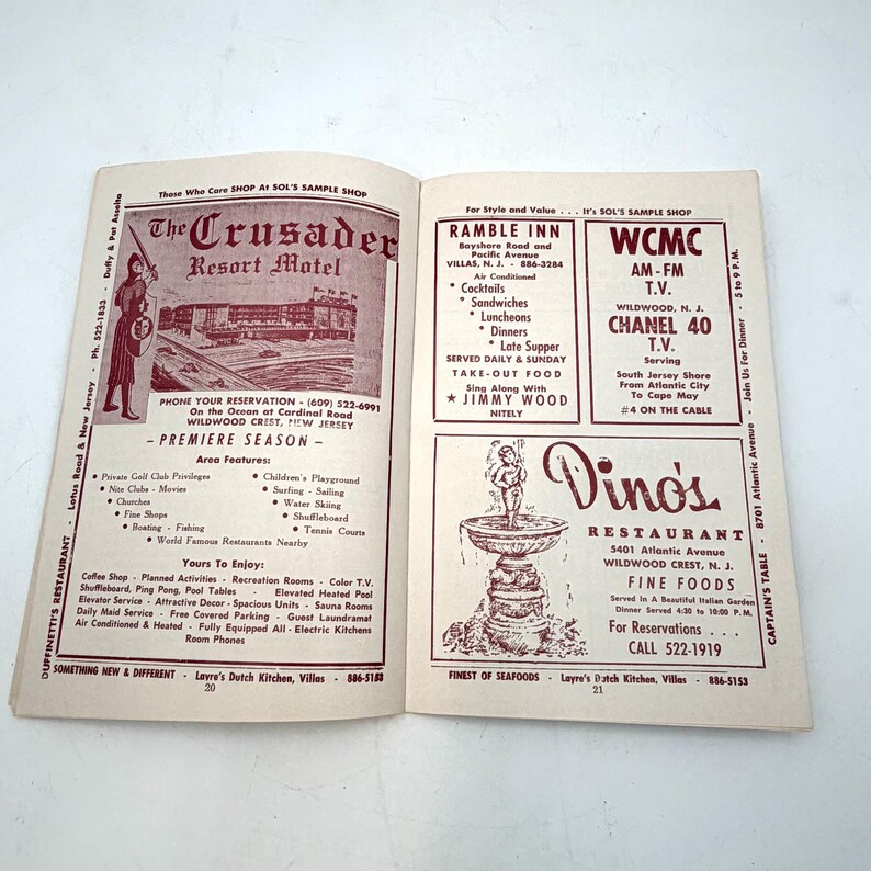 May include: Open vintage brochure featuring advertisements for local businesses and attractions in Wildwood Crest, New Jersey. Includes listings for restaurants, motels, and entertainment venues, with illustrations and contact information.