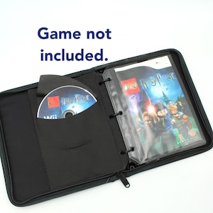 May include: Black zippered game case with a CD in a pocket and a game case in a clear sleeve. The text "Game not included" is above the case. The game case has a picture of Lego characters.