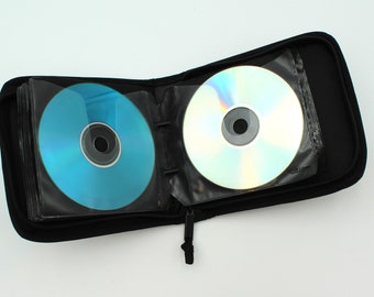 Vintage 1990s travel CD holder - Case Logic, black, 90s, DVDs, storage, car, video games, container, music, small, holds 24 disks!