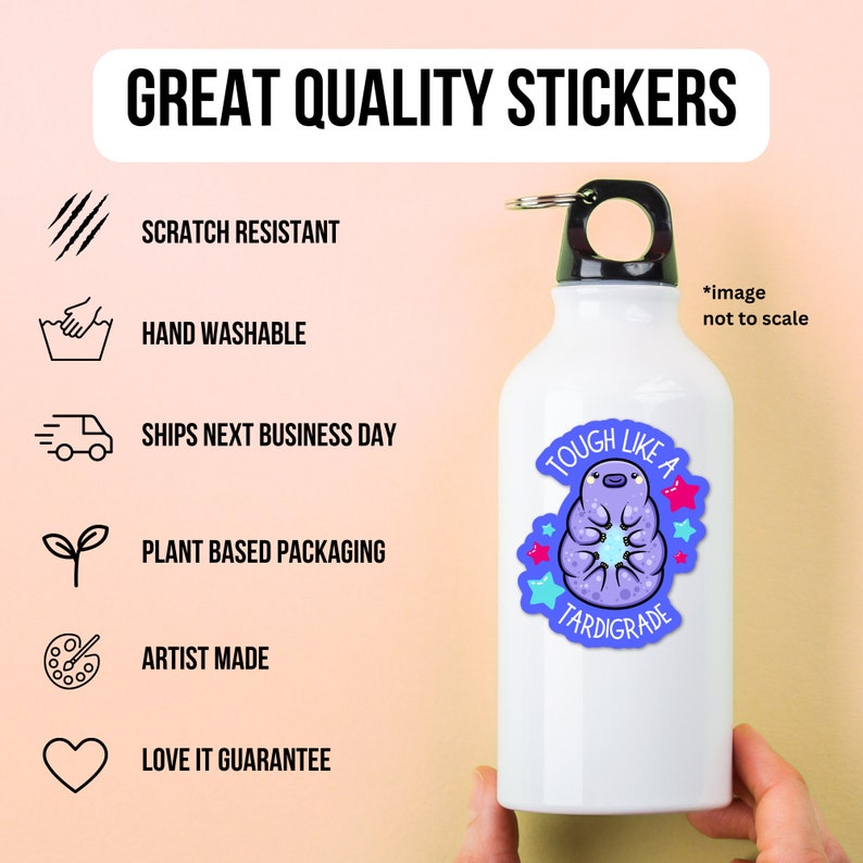 May include: A white water bottle with a black lid and a sticker of a purple tardigrade with the text "Tough Like A Tardigrade". The sticker has a blue background with pink stars. The bottle is on a white background.