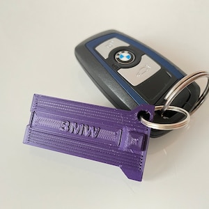 BMW M42 engine head as keychain - black, white, purple, gold