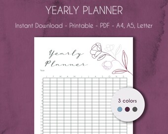 May include: A printable yearly planner with a floral design in shades of pink and burgundy. The planner has a grid layout with months labeled across the top and numbers down the side. The text "Yearly Planner" is at the top of the page. The text "3 colors" is in a circle with three colored dots.