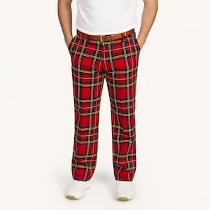 May include: A person wearing a white polo shirt, a brown belt, and red plaid pants with yellow and black accents. The person is also wearing white sneakers. The outfit is set against a white background.