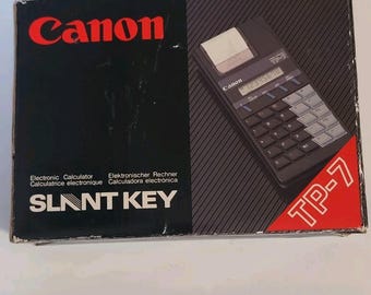 Calculadora electrónica/impresora de bolsillo Canon TP-7 vintage de los años 80 (nueva)