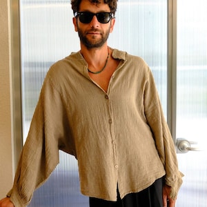 Batwing style unisex shirt made from organic cotton and linen blend, available in brown color