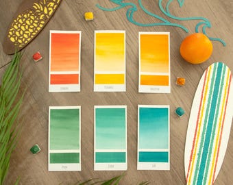 May include: A collection of watercolor swatches in shades of orange, yellow, and green, labeled "Sunset", "Pineapple", "Tangerine", "Palm", "Creek", and "Surf". The image includes decorative surfboards, a palm leaf, and a small orange.