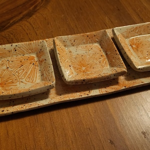 Orange slices oval plate, serving platter, with 3 matching trays