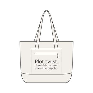 May include: A light beige tote bag with black handles and a front pocket. The pocket has a zipper and the text "Plot twist. Unreliable narrator. She's the psycho." printed in black.
