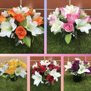 May include: Assortment of artificial flower arrangements in various colours, including white, orange, yellow, pink, red, and purple. Each arrangement features white lilies and roses in a variety of colours.
