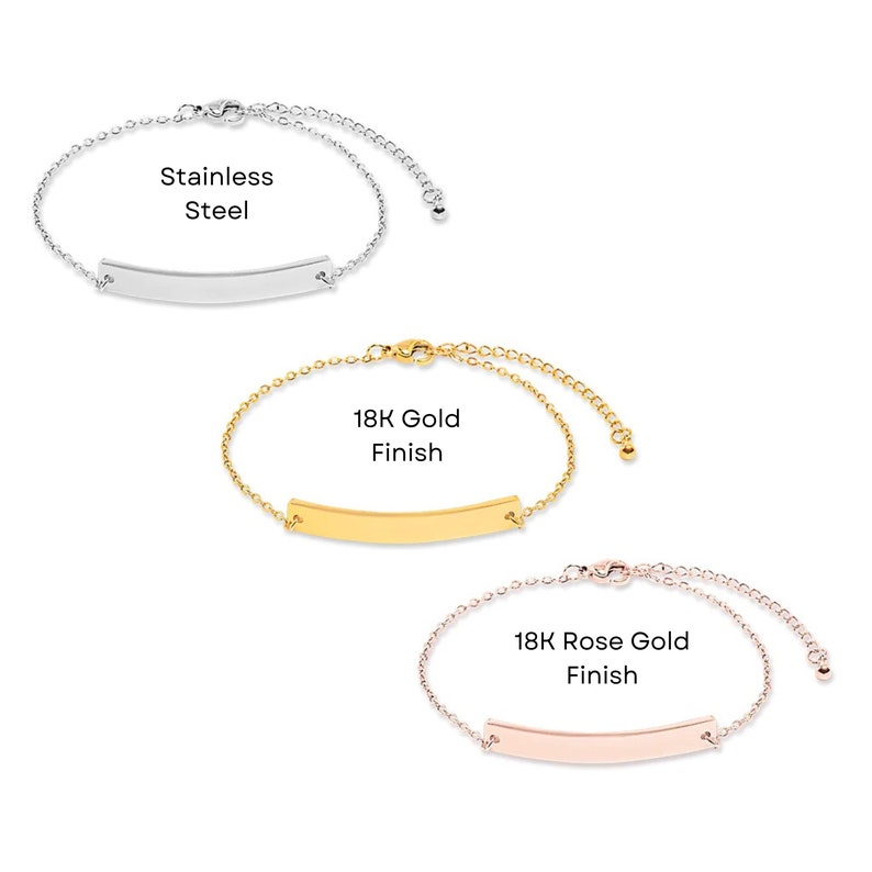 May include: Three delicate chain bracelets with a thin, flat bar charm. The bracelets are shown in three finishes: stainless steel, 18K gold, and 18K rose gold.