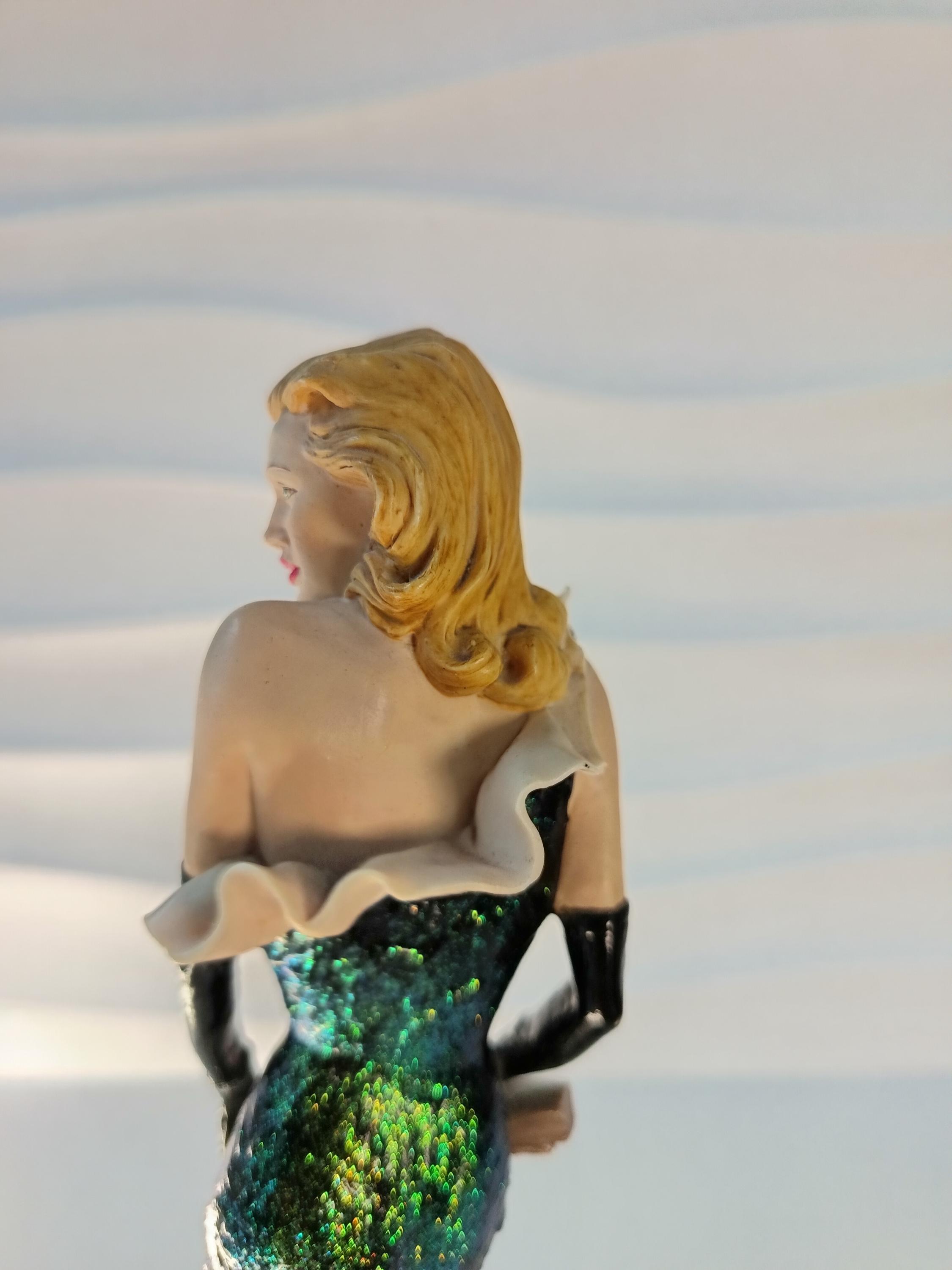 Resin Figurine Depicting an Elegant Woman. A Work by