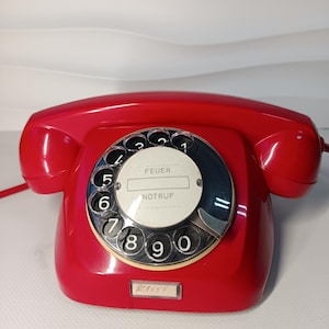 Vintage Urmet handset telephone from the 60s
