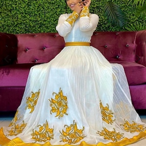 Ethiopian & Eritrean Traditional dress | Ethiopian dress, habesha dress Eritrean dress, Ethiopian Traditional Dress, Coffee Long Dress
