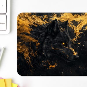 May include: A black wolf with glowing yellow eyes is surrounded by gold paint splatters on a black background.