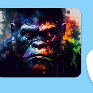May include: A colorful abstract painting of a gorilla's face with splashes of red, orange, yellow, green, and blue paint.