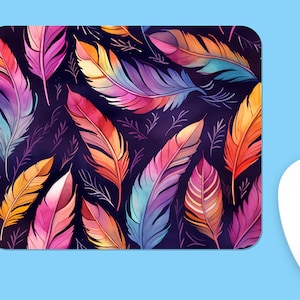 May include: A colourful mouse mat with a repeating pattern of watercolour feathers on a dark background.