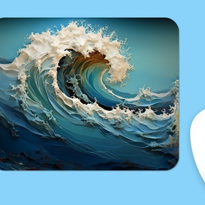 May include: A blue and white abstract wave design mousepad. The wave is made of paper-like layers and has a foamy white crest.