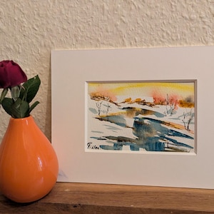 Winterabend am Fluss – Aquarell 10×15 cm im Passepartout 18×24 cm