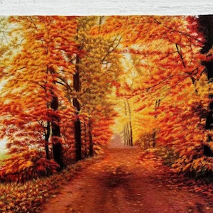 May include: An autumnal oil painting depicting a path winding through a forest. Trees with vibrant orange and yellow foliage line the route, which is strewn with fallen leaves. The artwork evokes a warm, inviting atmosphere.
