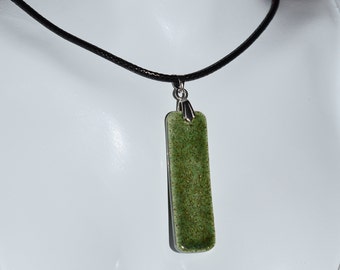 Necklace with handcrafted rectangular green ceramic pendant with bright mica. It is shipped in a gift box