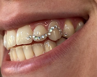 50-100x classic clear Swarovski Tooth Gems