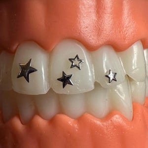 18K Tooth Gem Motive Weissgold & Gelbgold