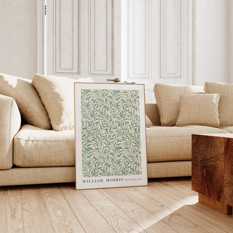 Puede incluir: Una impresi&oacute;n enmarcada de un patr&oacute;n floral verde y blanco con el texto "WILLIAM MORRIS Willow Bough, 1887".