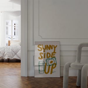 breakfast wall art, funny kitchen poster, egg toast illustration, coffee print, sunny side up wall art, retro breakfast poster, quirky food wall decor, positive quote poster, kitchen art, morning print, food quote poster, vintage print, aesthetic wall art, cafe decor print, modern kitchen wall art, cozy home print, foodie gift idea, uplifting breakfast art, modern kitchen print, inspirational quote, morning routine poster, minimalist kitchen decor, funky wall art, bold food illustration