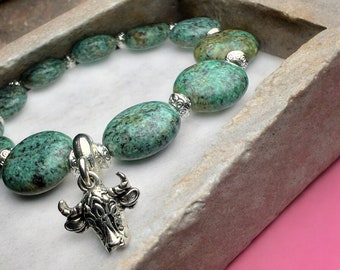 African Turquoise and silver spacers and bull charm