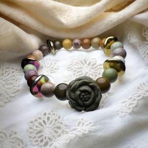Alashan carved flower with 8mm alashan agate beads with ripple spacers