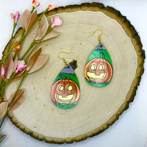 Halloween Jack-o-lantern teardrop dangle earrings wood and vintage magazine ads ephemera spooky season handmade jewelry silver gold