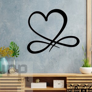 May include: Black metal wall decor in the shape of a heart with an infinity symbol. The decor is mounted on a light blue wall above a wooden shelf with a clock and plants.