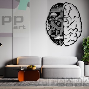 May include: A black and white wall decoration depicting a brain with a circuit board design. The decoration is hanging on a white wall in a living room setting with a grey sofa, a coffee table, and a floor lamp.
