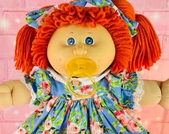 1983 1st Edition Cabbage Patch Kid Doll: Red Hair, Floral Dress, pacifier girl